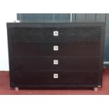 A Dwell stained oak chest of 4 drawers, H.75 W.100 D.43cm