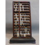 Early 20th century Chinese abacus, steel, bamboo and, wood, H.42 x W.24 x D.13 cm This is an