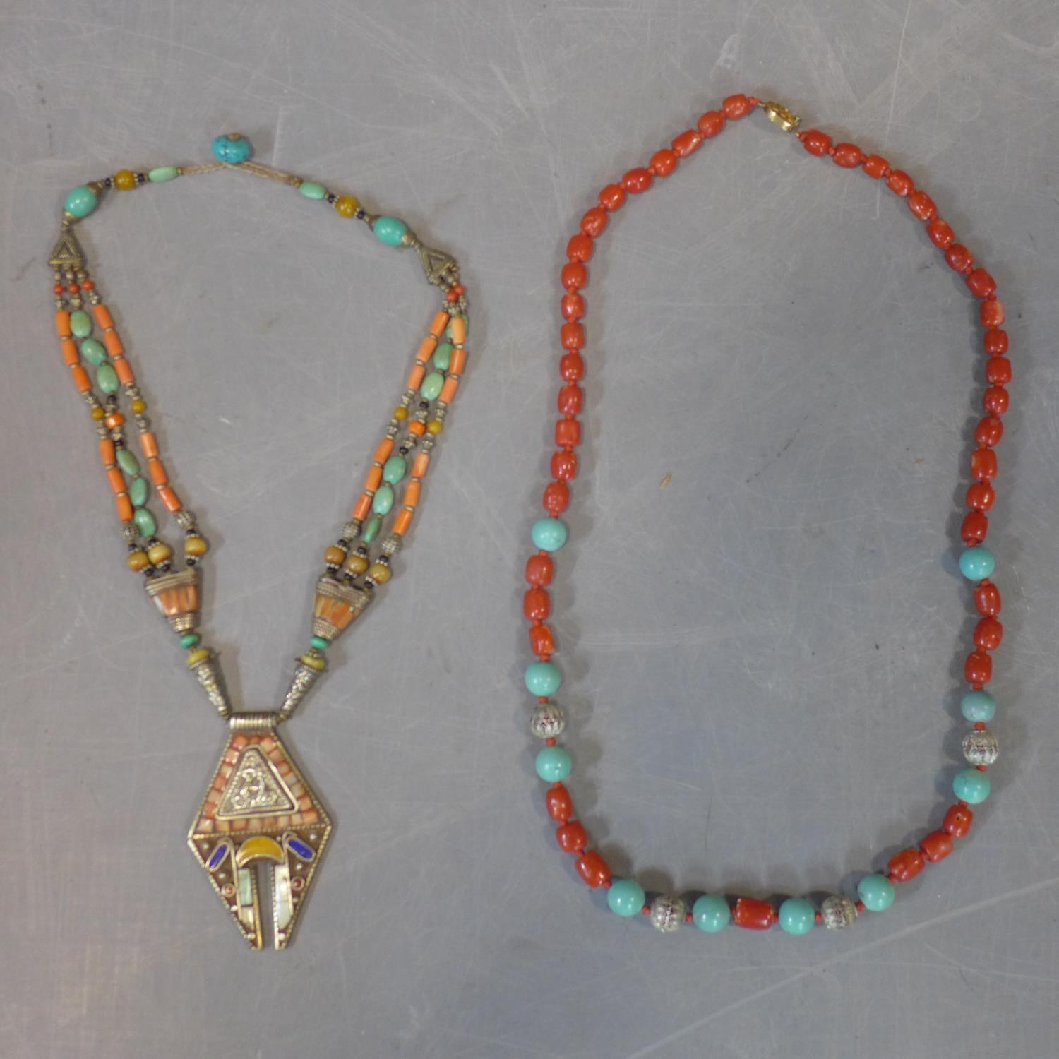 Three necklaces to include a coral beaded necklace, a turquoise and coral necklace, a turquoise, - Image 2 of 4