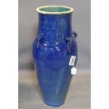 A Persian blue glazed Sharab wine vessel, H.74cm