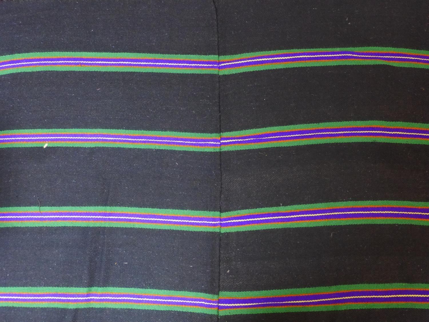 A woollen rug with purple, green, yellow and orange stripes on a black ground, 223 x 143 - Image 4 of 4