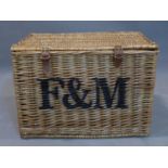 A contemporary Fortnum & Mason wicker basket