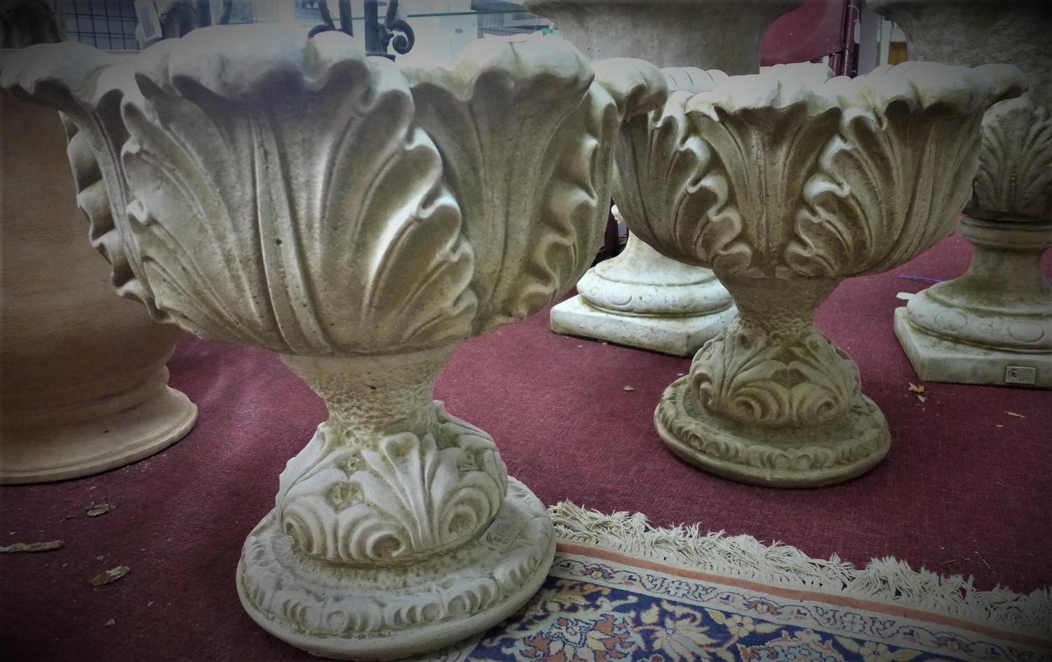 A pair of Edwardian style reconstituted stone planters, decorated with acanthus leaves, H.47cm