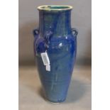 A Persian blue glazed Sharab wine vessel, H.74cm