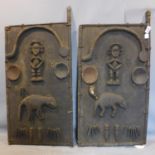 Two African tribal carved wooden granary doors from the Dogon people of Mali, each carved with
