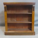 A 20th century mahogany open bookcase, with two adjustable shelves, on pedestal base, H.88 W.83 D.