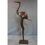 A tall metal figure of a ibis or a flamingo, H. 120 cm