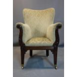 A Regency mahogany armchair with floral carving and scroll arms, on square tapered legs and castors,