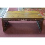 A Chinese hardwood low table, with carved and pierced frieze, H.35 W.87 D.46cm