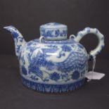 A Chinese blue and white teapot, decorated with phoenixes and scrolling foliage, H.12cm