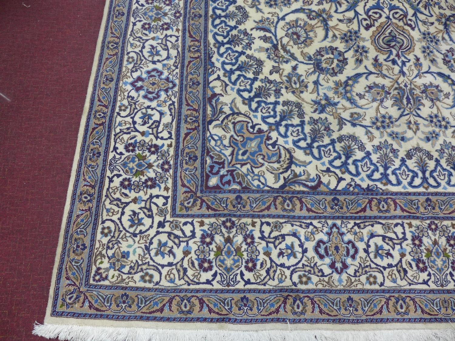 A large part silk Persian Nain Isfahan carpet, central medallion and stylised floral motifs on a - Image 2 of 3