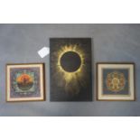 A black slate painted with a sun, and two Buddhist inspired wood panel, overall 30 x 40 cm