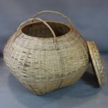A giant bamboo woven fish basket with lid, 20th century