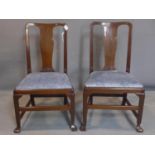 Two Edwardian mahogany chairs, with velour drop in seats.