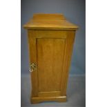 A Victorian pitch pine bedside cupboard, H.85 W.38 D.38cm