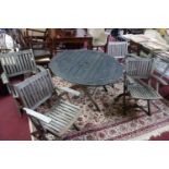 A John Lewis circular garden table and four chairs, with John Lewis plaques to chairs, H.73cm