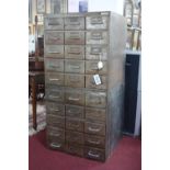Two 1950's metal filing cabinets, each with an arrangement of 15 drawers, H.72 W.69 D.66cm