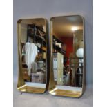 A pair of shaped mid-century rounded Corners gilt framed wall mirrors