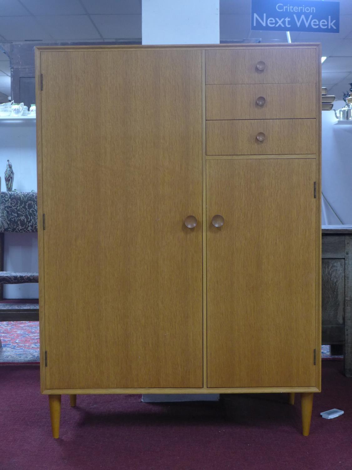 A fitted oak vintage gentlemans wardrobe by Meredew Furniture H.130x W.93 x D.45