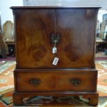 A 20th century inlaid mahogany cupboard, with two cupboard doors and single drawer, on bracket feet,