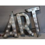 A light up metal sign for "ART" with satin lacquer finish, 95 x 125cm
