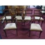 Four 19th century mahogany dining chairs, with drop-in seats, on sabre legs, together with two