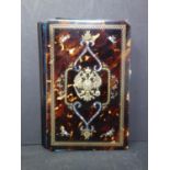 A 19th century Imperial Russian tortoiseshell and gilt inlaid note book, with central yellow metal
