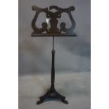 An Italian music stand by Victor Salvi, Genoa, with scrolled stand raised on turned support and