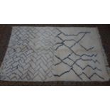 A Moroccan Berber Beni Ourain rug of abstract design, 250 x 156cm