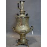 A 20th century Middle Eastern brass samovar, H.79cm