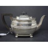 A tea pot, marked Robert Stewart, London 1913, 514 grams approximately 16,5 troy oz