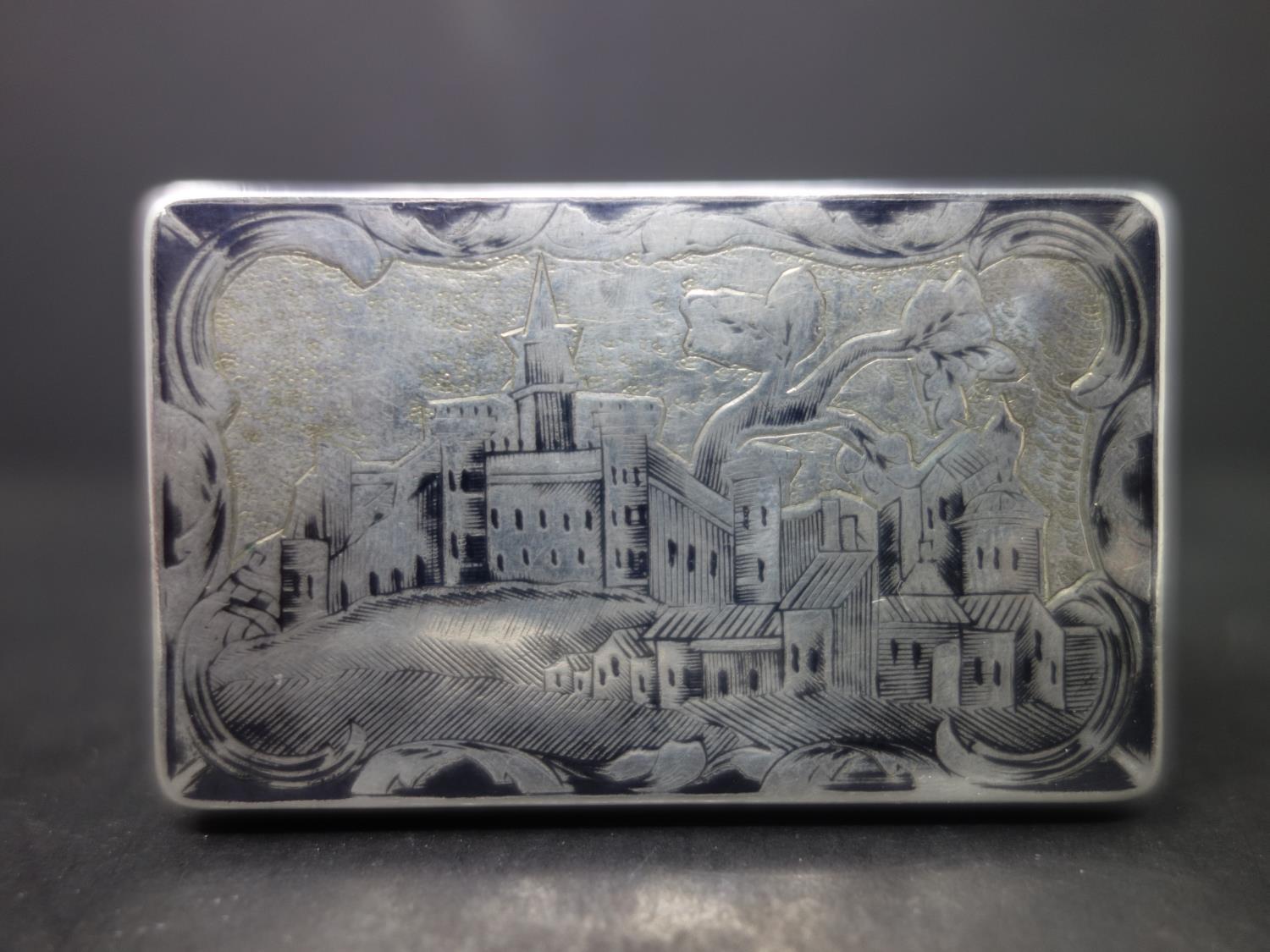 A rare 19th century Russian silver snuff box, with niello decoration, the top engraved with battle - Image 2 of 3