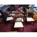 A set of 8 Regency style inlaid mahogany dining chairs, with X-shaped backrests