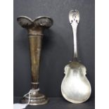 A silver tulip vase, with pierced scalloped rim above tapered stem and stepped circular base,