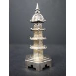 A late 19th century Chinese silver pagoda pepperette, on stepped hexagonal base, marked to base, H.