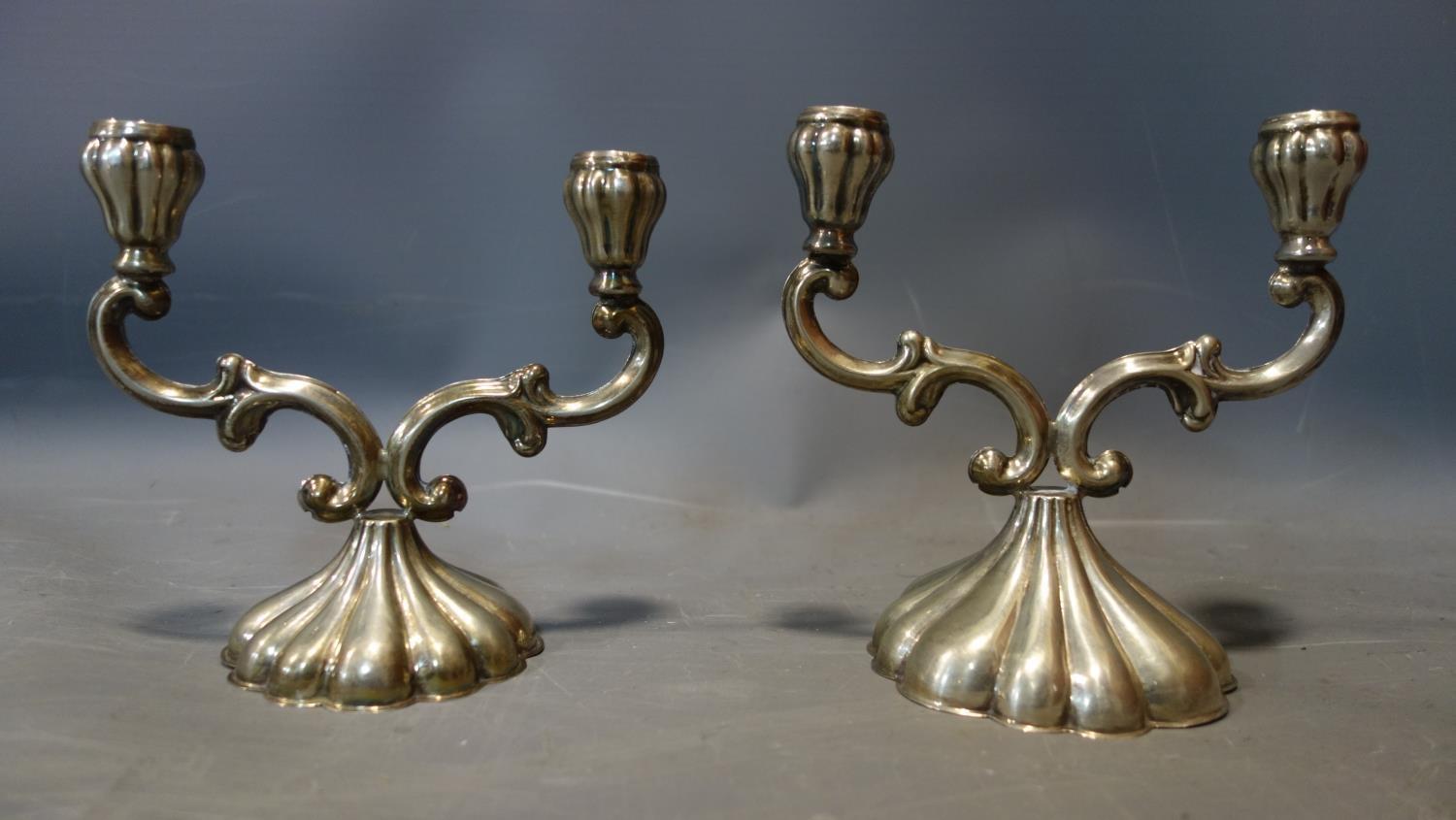 A pair of twin branch candelabra, 215 grams approximately 6.9 troy oz together with, one silver - Image 2 of 3