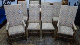 A set of 8 early 20th century Jacobean style oak dining chairs, to include 2 carvers