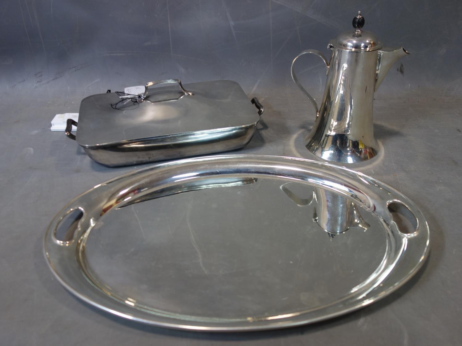 A silver plated tray together with an entree dish and coffee pot