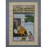 A late 19th century Mughal painted manuscript depicting two lovers and an attendant, framed and