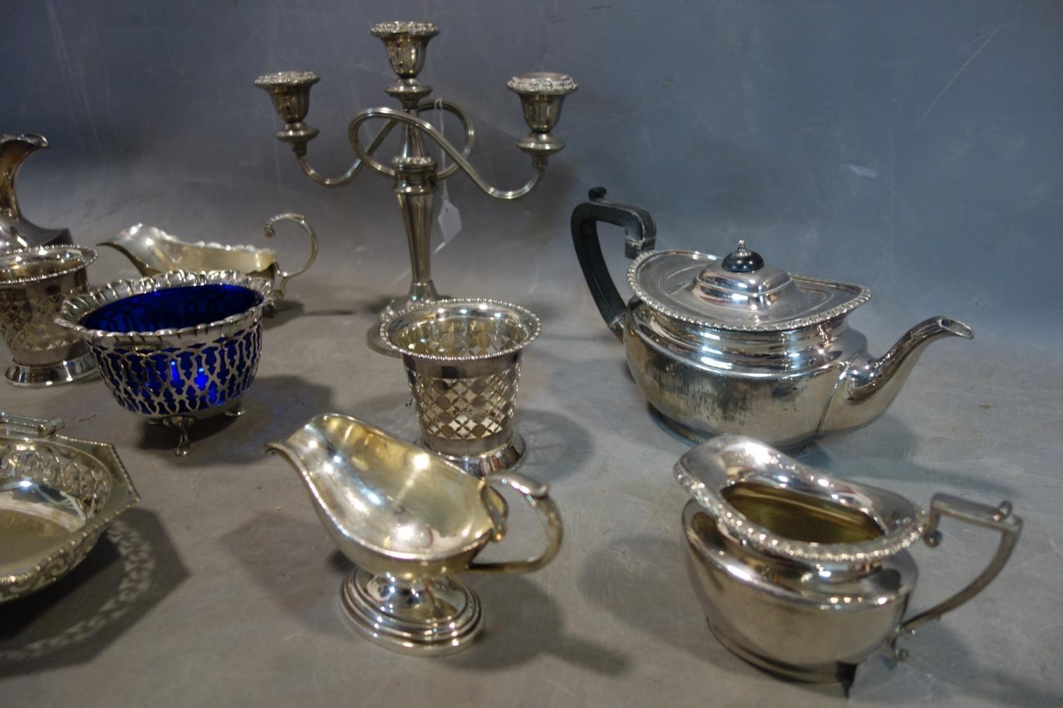 A collection of silver plated items, including a teapot and coffee pot, two sauce gravy boats, one - Image 2 of 3