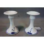 Two studio pottery candlesticks monogrammed to the base, H. 16 cm