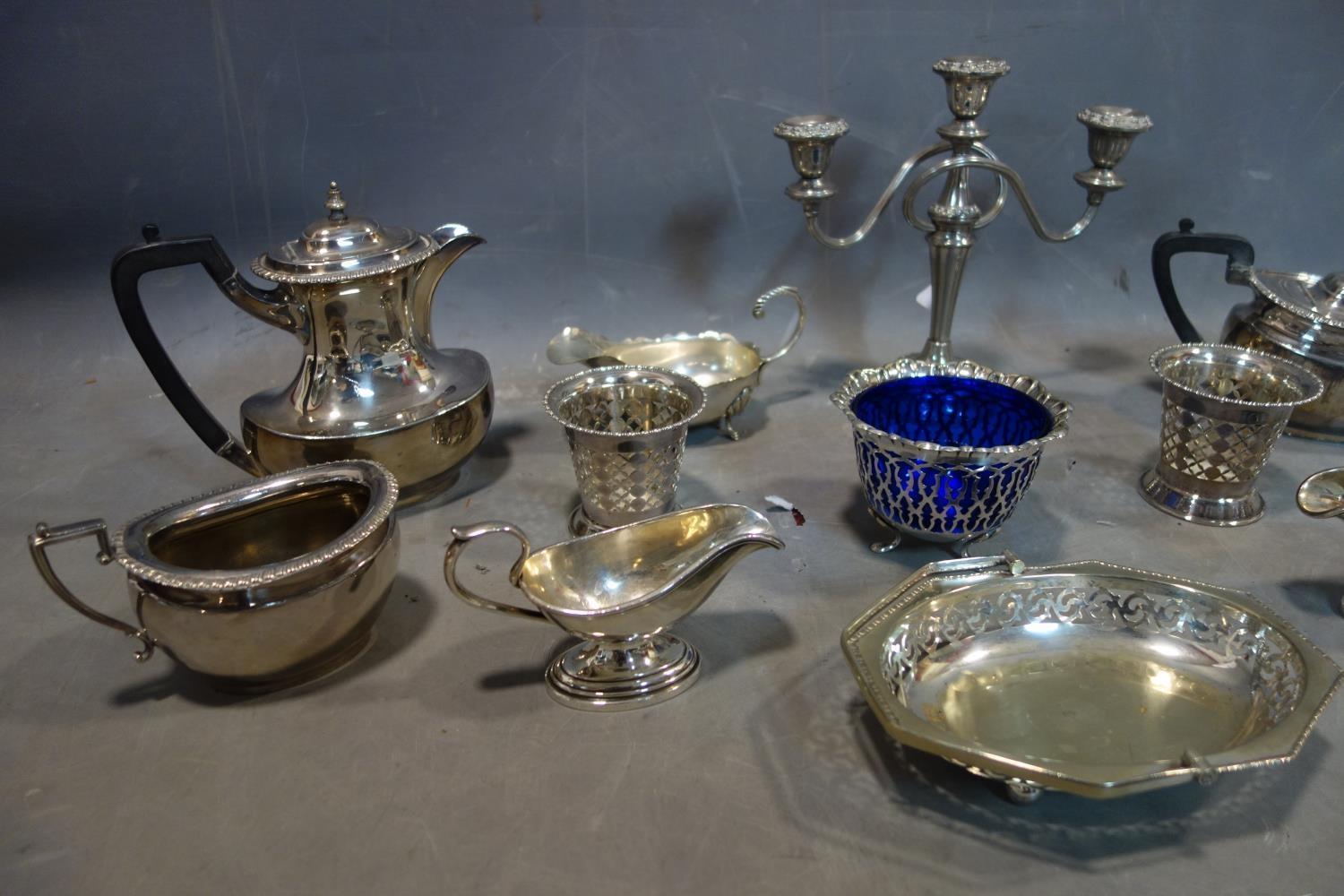 A collection of silver plated items, including a teapot and coffee pot, two sauce gravy boats, one - Image 3 of 3