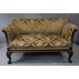 An early 19th century acanthus carved oak two seater sofa, raised on scrolling cabriole feet, H.79