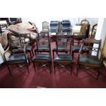 A set of 7 Regency mahogany dining chairs to include 1 carver, together with one similar carver