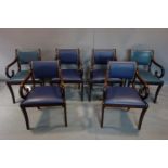 A set of six Regency style mahogany dining chairs with scroll arms, bearing makers label for