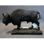 A resin sculpture of a bison by Minerva fine arts, H.21 W.30 D.12cm
