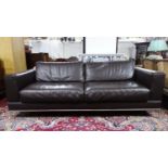 A contemporary brown faux leather sofa, W 206cm x D 90cm