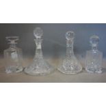 Three crystal glass decanters plus 1 moulded glass decanter