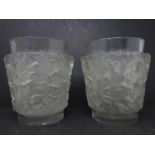 A pair of Rene Lalique 'Bacchus' frosted glass vases, minor chips on both, H.18 D.16cm