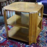 A 20th century oak 3 tier lamp table, H.51 W.53 D.53cm